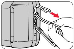 NIKON LITE TOUCH ZOOM 100ED-QD - Fixation de la dragonne - 1