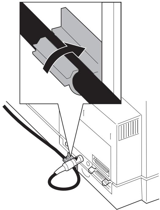 LEXMARK FORMS PRINTER 4227 - Placez l'attache-cable à l'arrière de l'imprimante, contre l'arête réservée à cet effet, la partie ouverte dirigée vers le haut. - 2