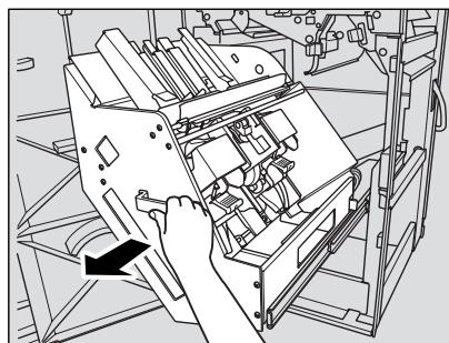 KONICA MINOLTA 7272 - Sortez l'unité d'empilage en tirant sur sa poignée. - 1