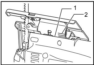 Technical diagram of a mechanical assembly with labeled parts 1 and 2