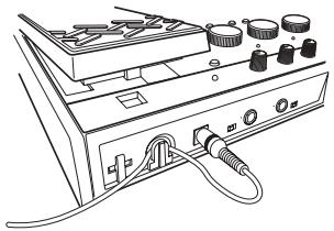 KORG AX10G - Lors d'une alimentation avec l'adaptateur secteur : - 1