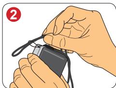 AIPTEK POCKET DV M1 - Enfilier le corps de la dragonne à travers la boucle. - 1