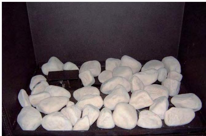 WANDERS NORMA - Plaatsen van de keramische pebble stenen (aardgas en propaan) - 2