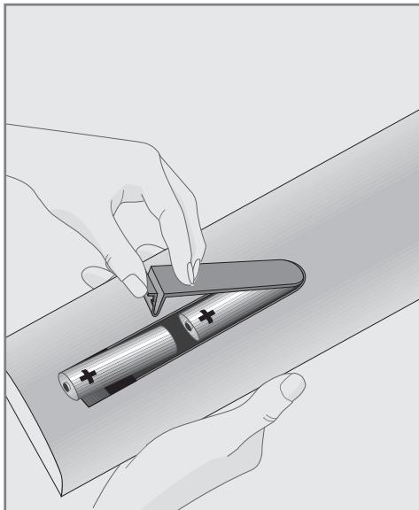 GRUNDIG 28VLE5500BG - Insertion des piles dans la télécommande - 1