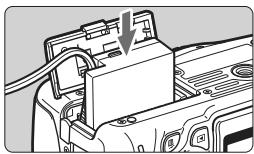 CANON EOS 600D - Branchez le coupleur secteur. - 1