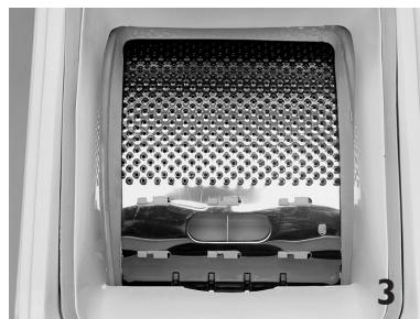 WHIRLPOOL AWE6235 - Récupération d'un objet tombé entre le tambour et la cuve - 1