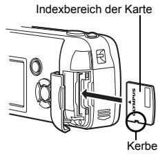 OLIMPUS D575 ZOOM - Schlieben Sie den Kartenfachdeckel. - 1
