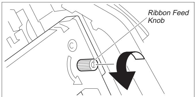 TALLY T2130-9 - Installing the ribbon cassette - 8