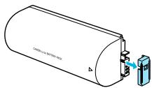 CANON SELPHY CP800 - Rimuovere il coperchio della batteria. - 2
