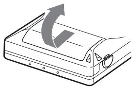 SONY MZ-NE410 - Insert an alkaline dry battery. - 1