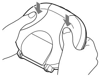 SONY RDP-NWR100 - Unfasten the buckles. - 1