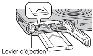 SONY CYBER-SHOT DSC-WX9 - Insertion de la batterie - 2