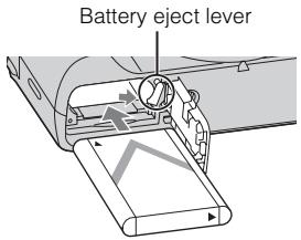 SONY CYBER-SHOT DSC-HX50, DSC HX 50 - Inserting the battery pack - 2