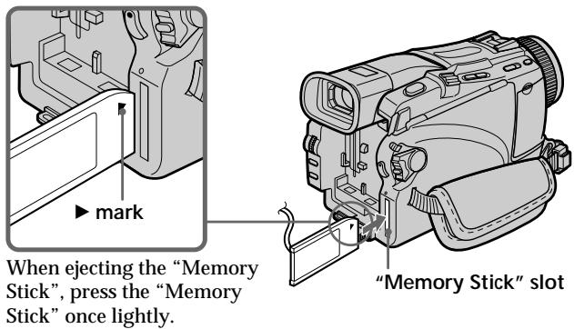 SONY DCR-TRV24E - Inserting a "Memory Stick" (p. 143) - 1