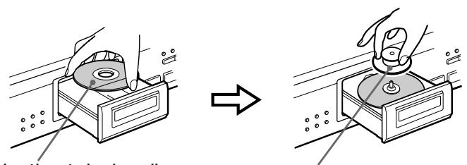 Diagram illustrating the process of cleaning a device, showing before-and-after states with labeled components and directional arrow.