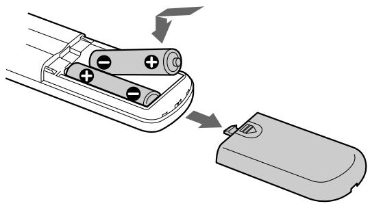 SONY CDP-XE900 - Introdução das pilhas no telecomando - 1