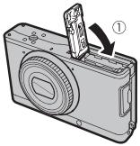 FUJIFILM XF1 - Fermez le couvercle du compartment de la batterie. - 3