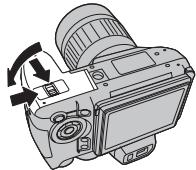 FUJIFILM HS10 - Fermez le cache du compartmente a batterie. - 1
