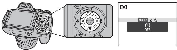 FUJIFILM HS10 - Reglez le retardateur. - 1