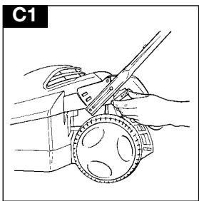 Illustration of hands using a tool to cut a circular object, no text or symbols present