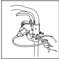 Line drawing of a hand using a tool to adjust or install a mechanical component (no text or symbols present)