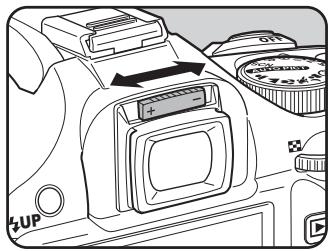 PENTAX K-M - Regardez dans le viseur et faites glisser le levier de réglagedioptrique vers la gauche ou la droite. - 1