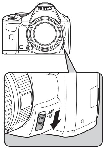 PENTAX K-M - Réglez le curseur du mode de mise au point sur AF. - 1