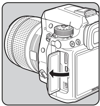 PENTAX K5 - Utilisation de l'adaptateur secteur (en option) - 1