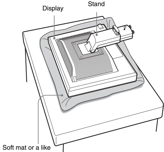 SONY SDM-S95AR - Take the display out from the carton and then place the frame of the laid display along the edge of the desk. - 1