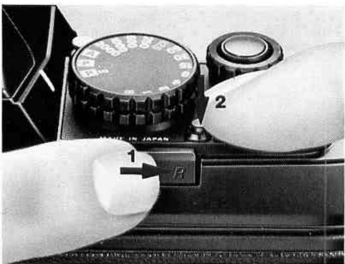 NIKON F301 - L'entrainement du film cesse automatiquement a la fin du film. - 3