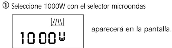 ① Seleccione 1000W con el selector microondas 1000W aparecerá en la pantalla.