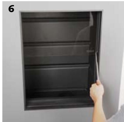 STUV 21-65H - Placement de la préhension d'ouverture de vitre du foyer - 6