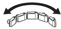 CASIO ZR710 - Appuyez à fond sur le déclencheur, après quoi une flèche curseur apparait sur l'écran de contrôle. Bougez lentement l'appareil photo dans le sens de la flèche sur l'écran jusqu'à ce que la flèche curseur atteigne l'autre extrémité du panorama (par ex. complètement à droite si vous bougez l'appareil photo vers la droite). - 1