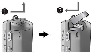 SAMSUNG YP-53X - Insertion de la pile - 1