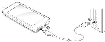 SAMSUNG YP-R2CS - Connector le lecteur à un ordinateur et charger la batterie - 1