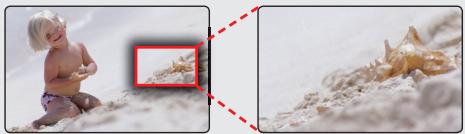 SAMSUNG HMX-E10OP - Pour effectuer un zoom arrière - 1