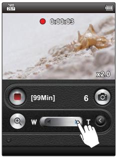 SAMSUNG HMX-E10OP - Pour effectuer un zoom arrière - 3