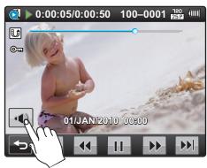SAMSUNG HMX-E10OP - Pour régler le volume durant la lecture de vidéo - 1