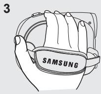 SAMSUNG VP-DX205 - COMMENT TENIR LE CAMESCOPE DVD - 3