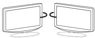 Two computer monitors connected by a double arrow, no text or symbols present