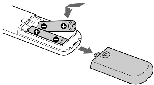 SONY CDP-XB740 - Introduisez les piles dans la télécommande - 1