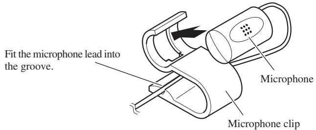PIONEER AVIC-9DVD-2 - Install the microphone on the microphone clip. - 1