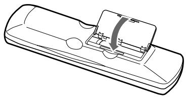 ONKYO DV-SP404EM - Refermez le compartment des piles. - 1