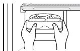 Technical diagram of a refrigerator with labeled parts and circular annotations indicating measurement or design notes.