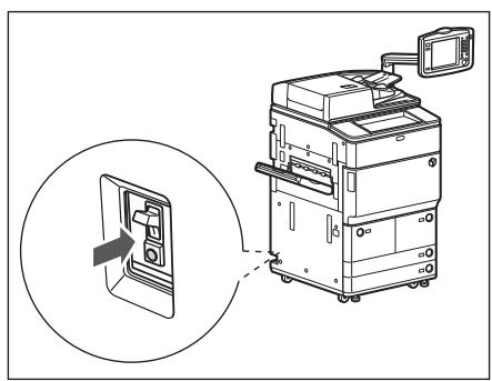 CANON IMAGERUNNER ADVANCE 8085 - Push the test button on the rear of the machine with the tip of a ball-point pen, or a similar object. - 1