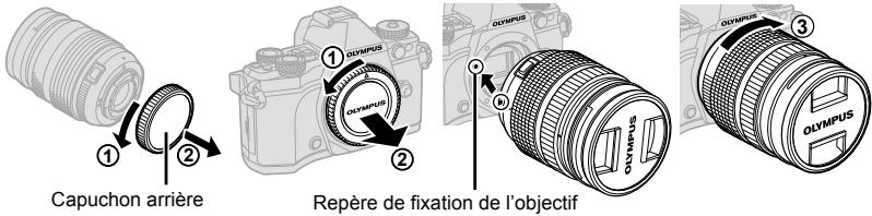 OLYMPUS E-M5 MARK II - Montez un objectif sur l'appareil photo. - 1