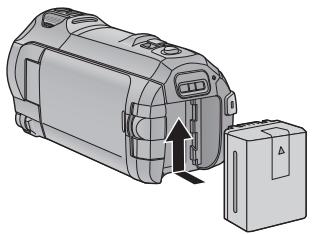 PANASONIC HC-V750 - Insertion/retrait de la batterie - 1