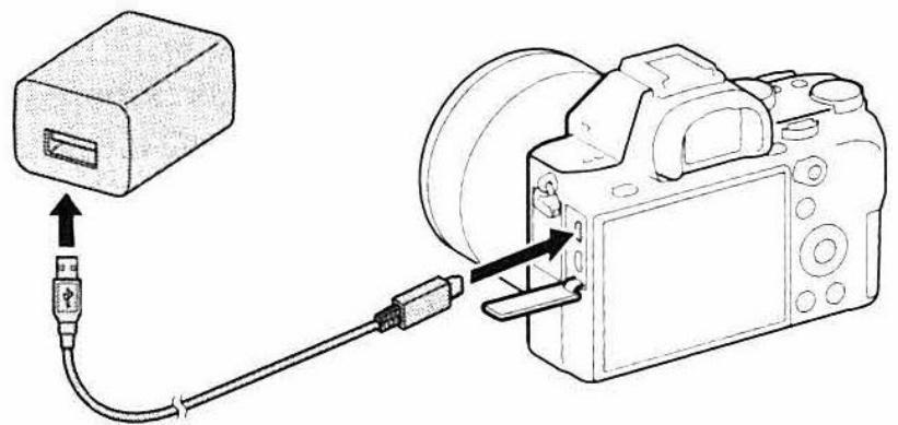 SONY ALPHA A580 - Connect the camera to the AC Adaptor (supplied) using the micro USB cable (supplied), and connect the AC Adaptor to the wall outlet (wall socket). - 1