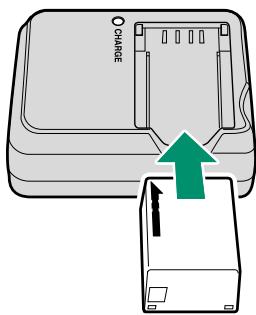 FUJIFILM X-T10 - Place the battery in the charger. - 1
