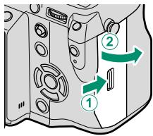FUJIFILM X-T1 - Open the memory card slot cover. - 2